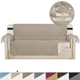 AquaHaven Decor waterproof velvet sofa cover with non-slip design, draped over a sofa to protect and decorate.
