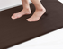 AquaHaven Decor memory foam bath mat with soft, absorbent surface and anti-slip backing, coastal bathroom decor style.