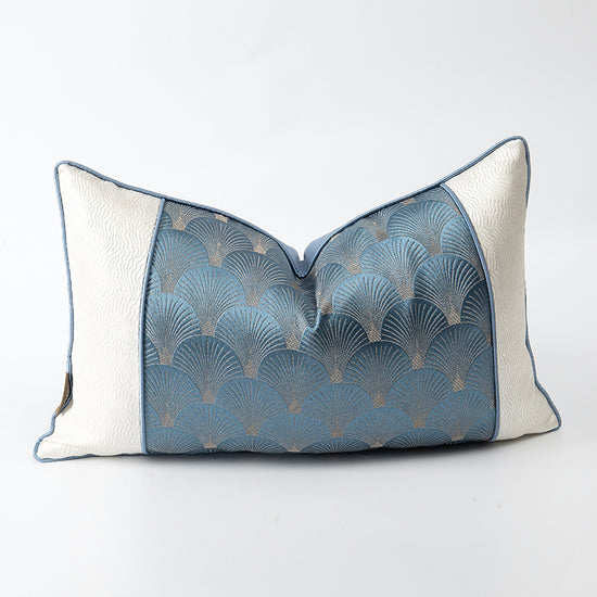 Blue and white patchwork cushions for sofa decor by AquaHaven Decor, featuring vibrant fabric patterns and plush comfort.