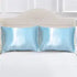 AquaHaven Decor soft satin pillowcases set of 2, smooth fabric with elegant sheen, shown on a bed with pillows.